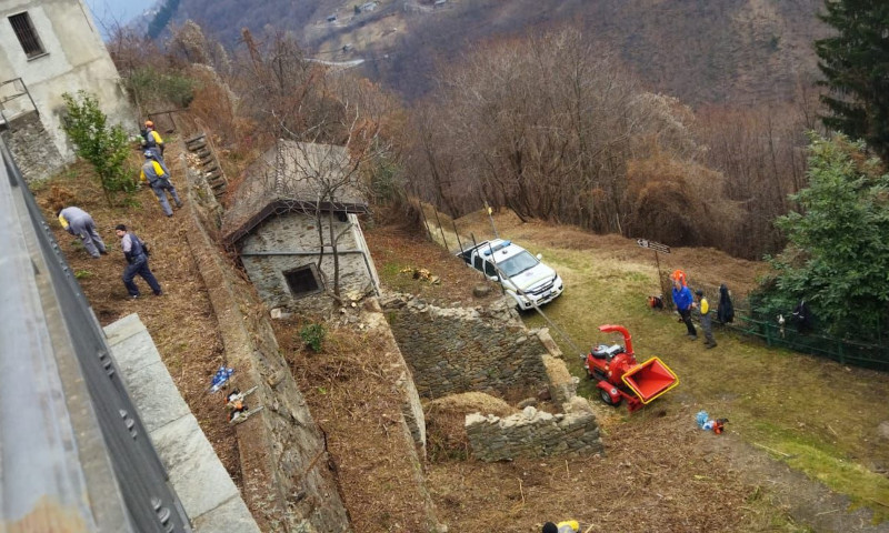 Rasura Protezione Civile pulizia giardino parrocchiale
